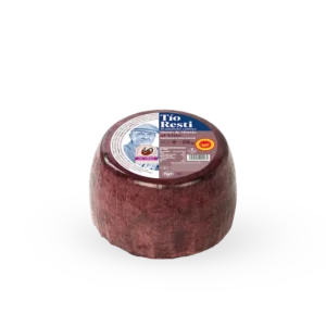 Queso de cabra al vino tinto Tío Resti 500 g, elaborado artesanalmente en Murcia con leche de cabra murciano-granadina y curado con vino natural.